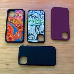 Various IPhone 11 cases including wallflower case